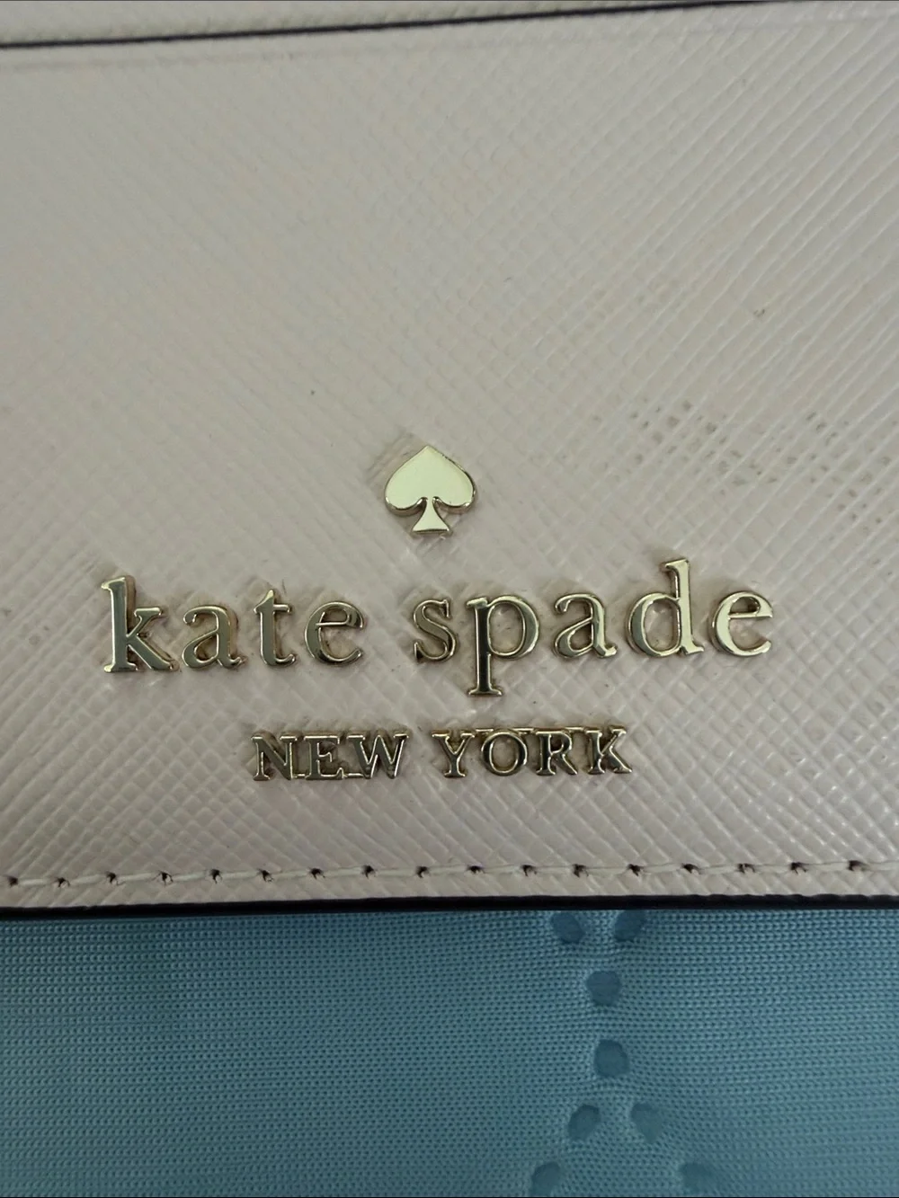 kate spade light pink leather card case with gold logo